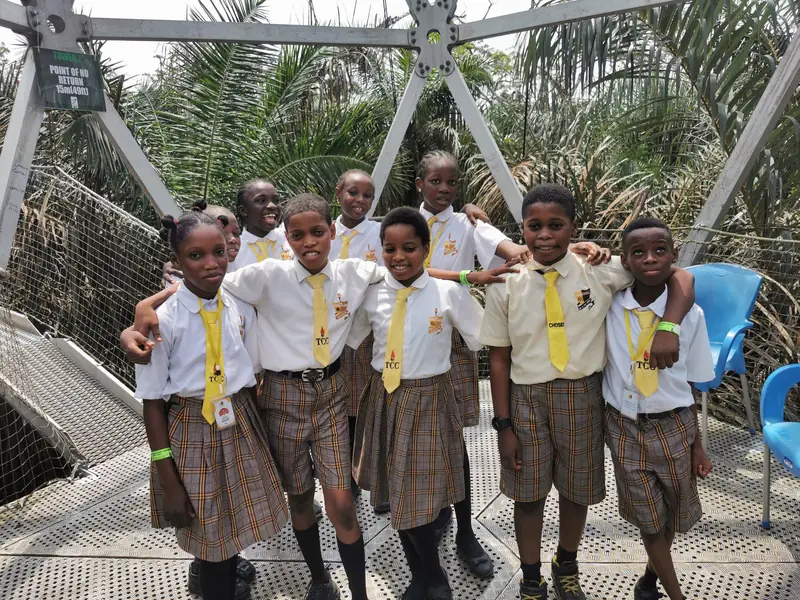 Students gathered on a canopy walkway